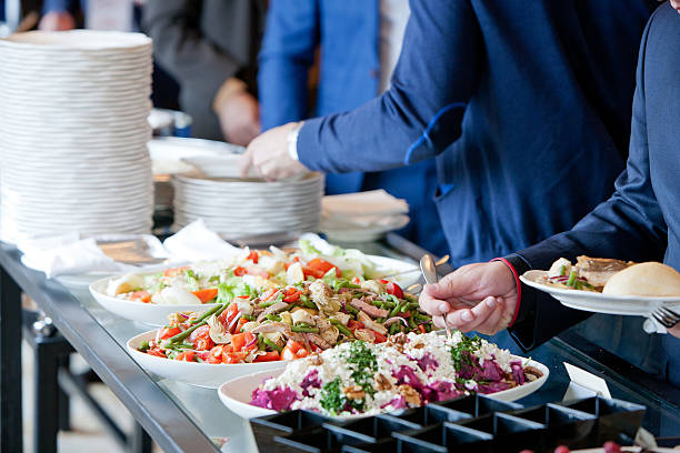 istock people at a banquet 616231162