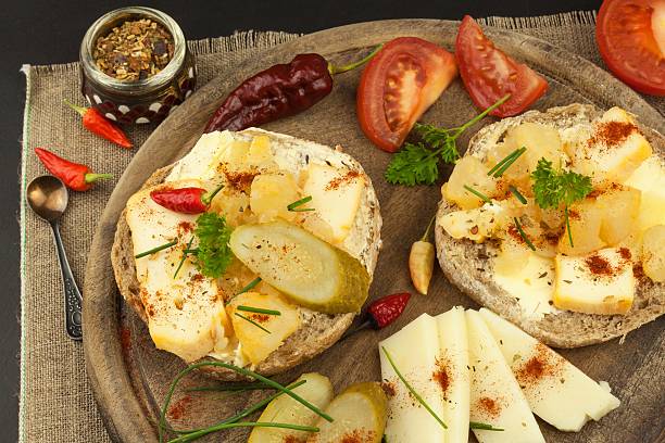 istock Two kinds of cheese on bread. Healthy breakfast 616231434