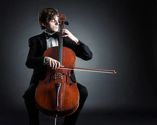 Cellist playing classical music on cello