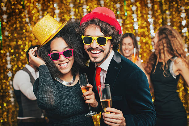 istock Couple having fun on New Year's party 616234478