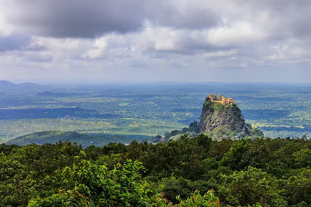 Mt Popa is a 4980 ft extinct volcano with a holy shrine on its top. Mt Popa is one of the most revered places for nat worship.