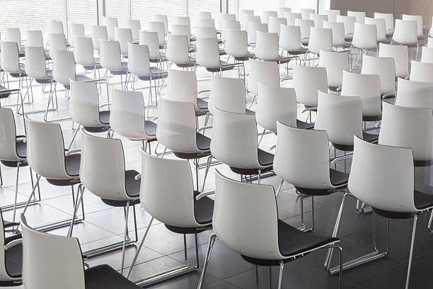 empty white chairs in contemporary conference hall with - presentation convention center conference call meeting imagens e fotografias de stock