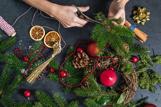istock Artisan woman working on handmade Christmas decorations 616241352