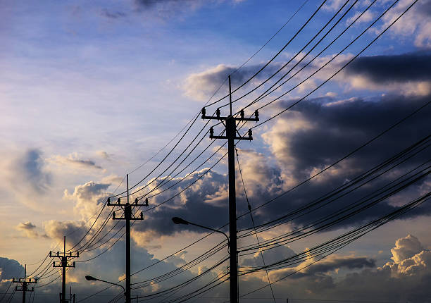istock Power poles with wires lot. 616241518