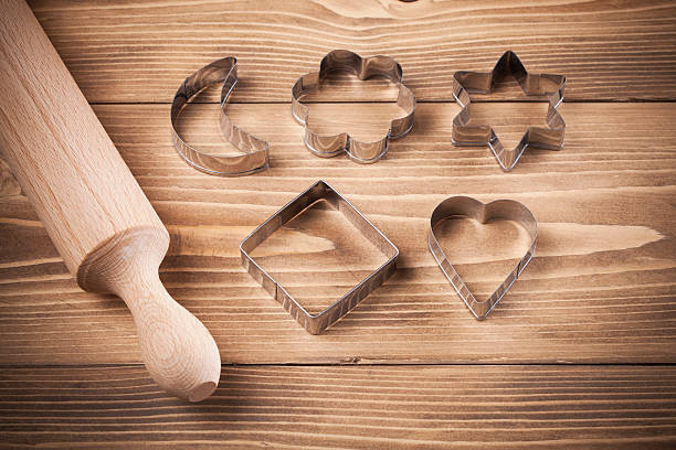 istock pastry cutters on wooden  board 616243786
