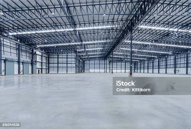 Interior Of Empty Warehouse Stock Photo - Download Image Now - Flooring, Warehouse, Concrete