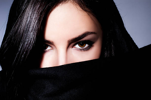 istock woman closeup portrait with expressive eyes 616244654