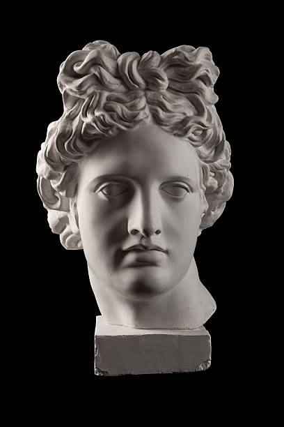 gypsum statue of apollo's head on a black background - sculpture art greek culture statue imagens e fotografias de stock