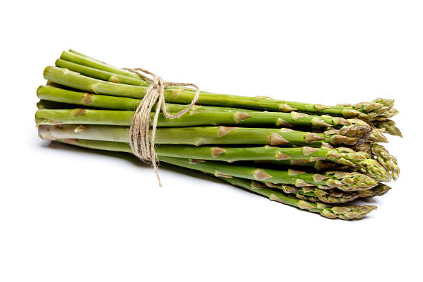 istock harvested asparagus isolated on white 616250914