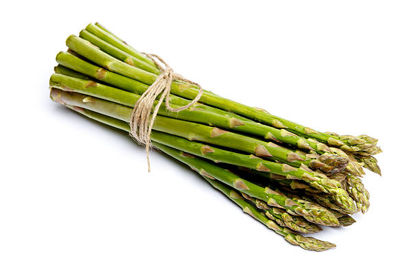 istock harvested asparagus isolated on white 616250940