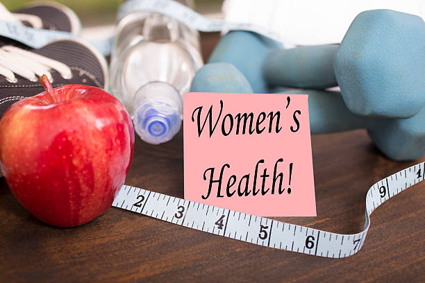 istock Fitness, exercise themed scene with Women's Health note. 616251098