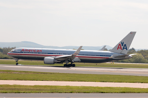 Manchester, United Kingdom - May 8, 2016: American Airlines Airbus A330 wide-body passenger plane (N362AA) landing to Manchester International Airport runway.