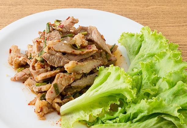 istock Spicy Grilled Beef Salad on A Wooden Table 616253808