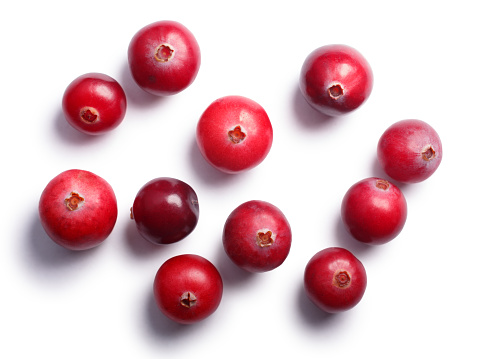 Wild cranberries (Vaccinium oxycoccus), top view. Clipping paths, shadow separated