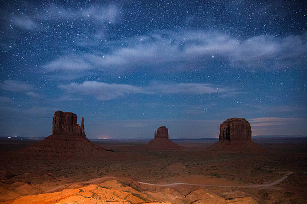 Monument Valley on the border between Arizona and Utah Night at Monument Valley on the border between Arizona and Utah west mitten stock pictures, royalty-free photos & images
