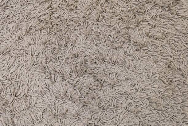 istock Detail of Brown Fluffy Fabric Texture Background 616254462
