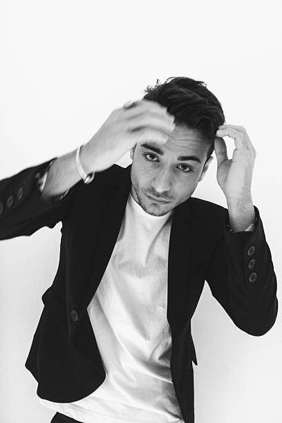 istock Serious fashion man portrait 616258030