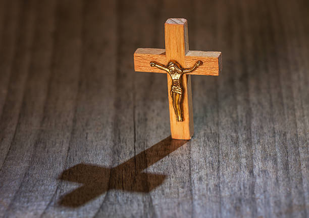 istock holly Christian cross 616258168
