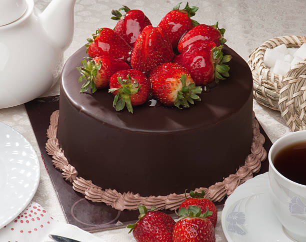 istock chocolate cake with fresh strawberry 616261564