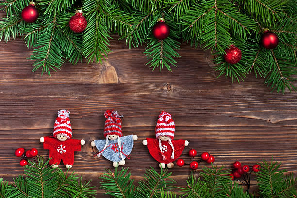 istock Christmas fir tree with decoration on  wooden board 616264842