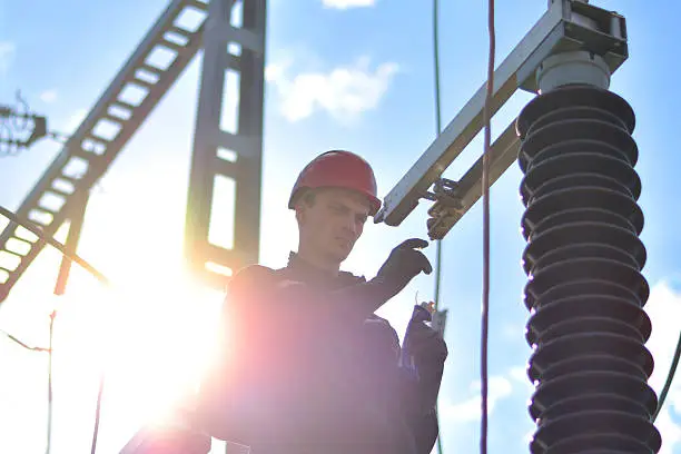 Photo of Construction Worker Working in Hight with Protective Equipment