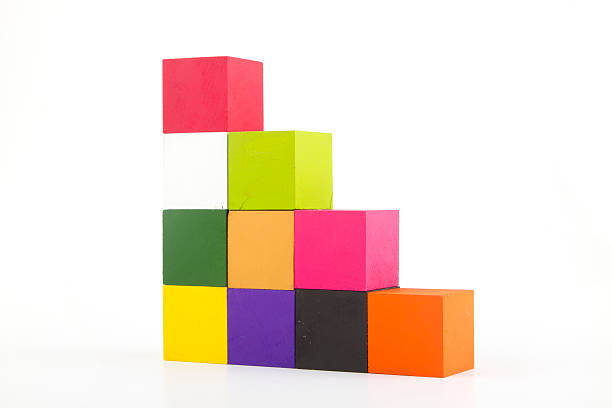 istock Colorful woods cube arrange in stairs shape isolated on white. 616265704