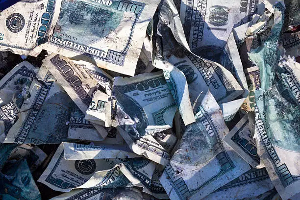 Photo of Pile of crumpled dollars