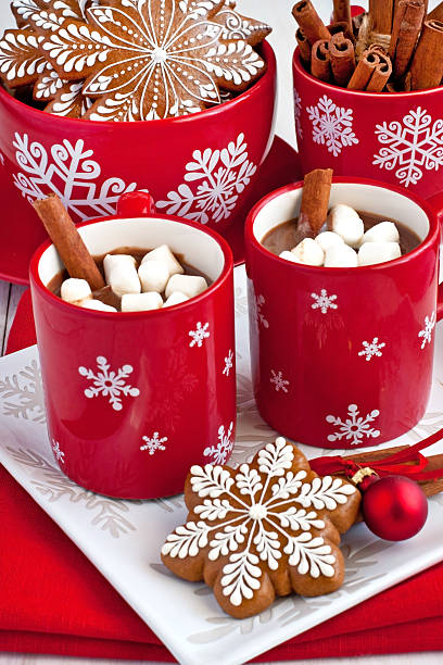 istock Red mugs with hot chocolate and marshmallows 616863098