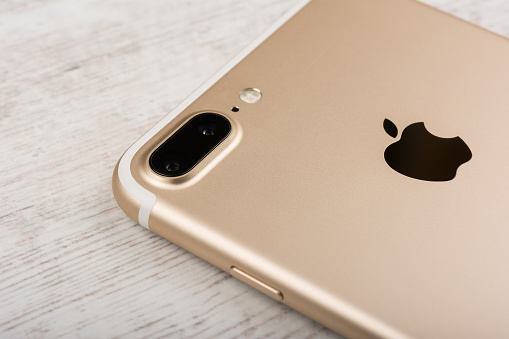 Burgas, Bulgaria - October 22, 2016: New Apple iPhone 7 Plus Gold on white background, back side, illustrative editorial.