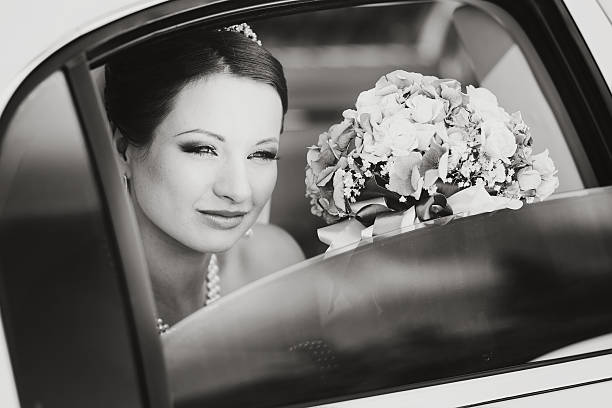istock young beautiful red bride with bouquet in garden 616867212