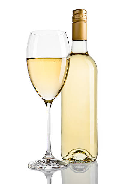 istock Bottle and glass of white wine with reflection 616867894