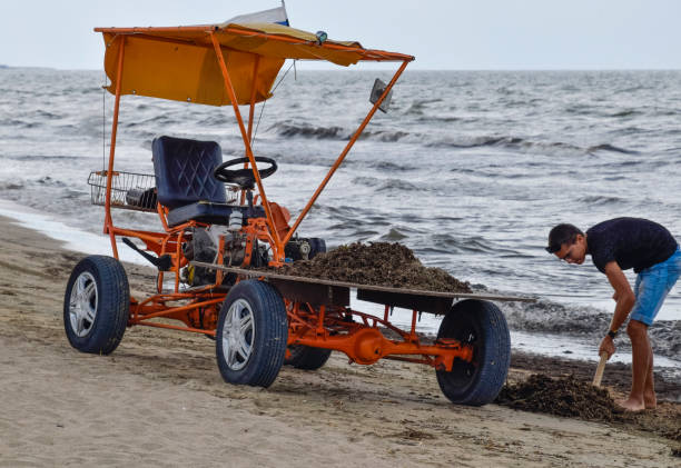 The car for garbage collection from the beach