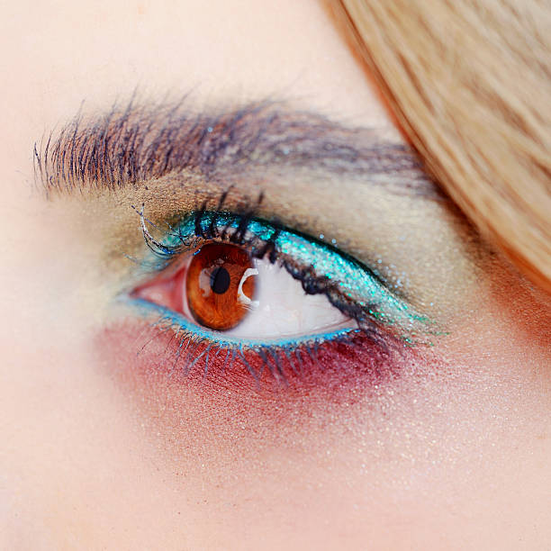 istock Eye makeup artist applying eyeshadow 616868688