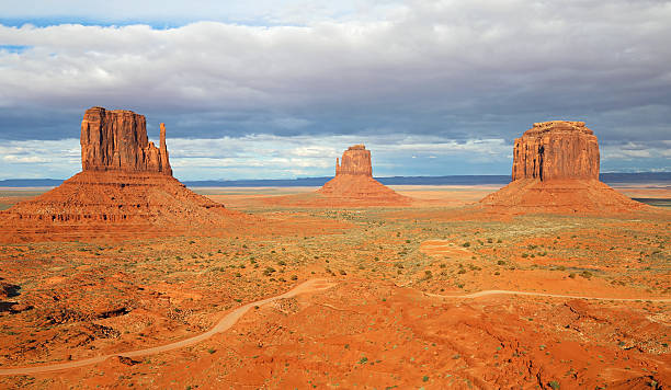 Classic view at three monuments Landscape in Monument Valley, Arizona merrick butte stock pictures, royalty-free photos & images