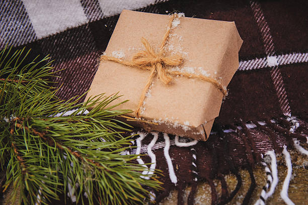 istock Christmas gifts box presents on brown 616881624