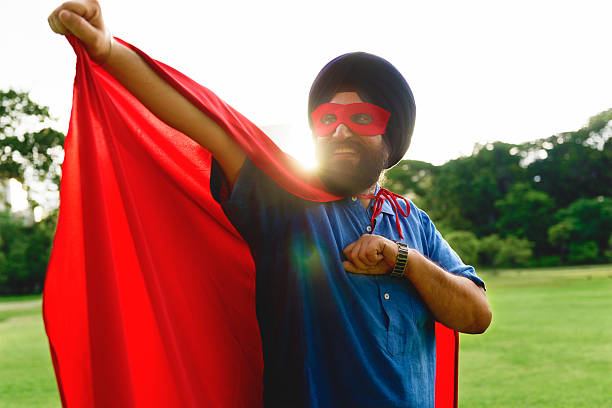 istock Indian Man Superhero Power Concept 616884578