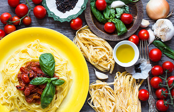 istock Italian food cooking ingredients for tomato pasta 616886270