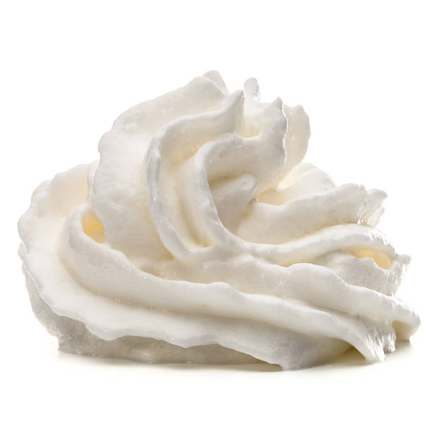 istock Whipped cream swirl  isolated on white background cutout 616886602