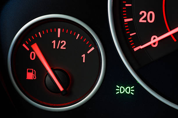 Fuel Gauge with motion blurred needle stock photo