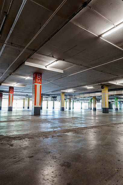 istock Parking garage interior, industrial building 616888538