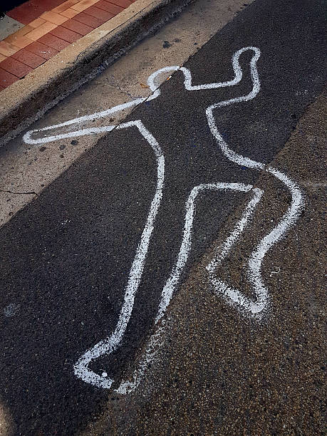 istock Body outline on road 616889546