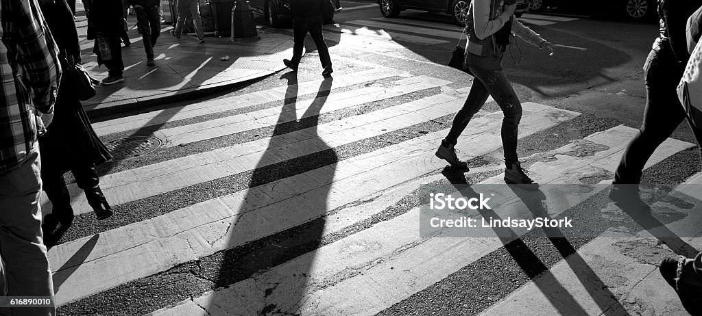 People walking on crosswalk in NYC New York City Street Scenes Black And White Stock Photo