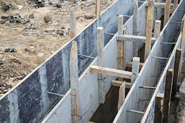 istock Laying the foundation of drainage system 616890662