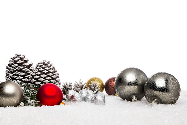 istock Pine cone and Christmas tree ball in decorative snow 616892766