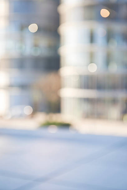 istock Blurred / defocused urban place with modern office buildings 616894554