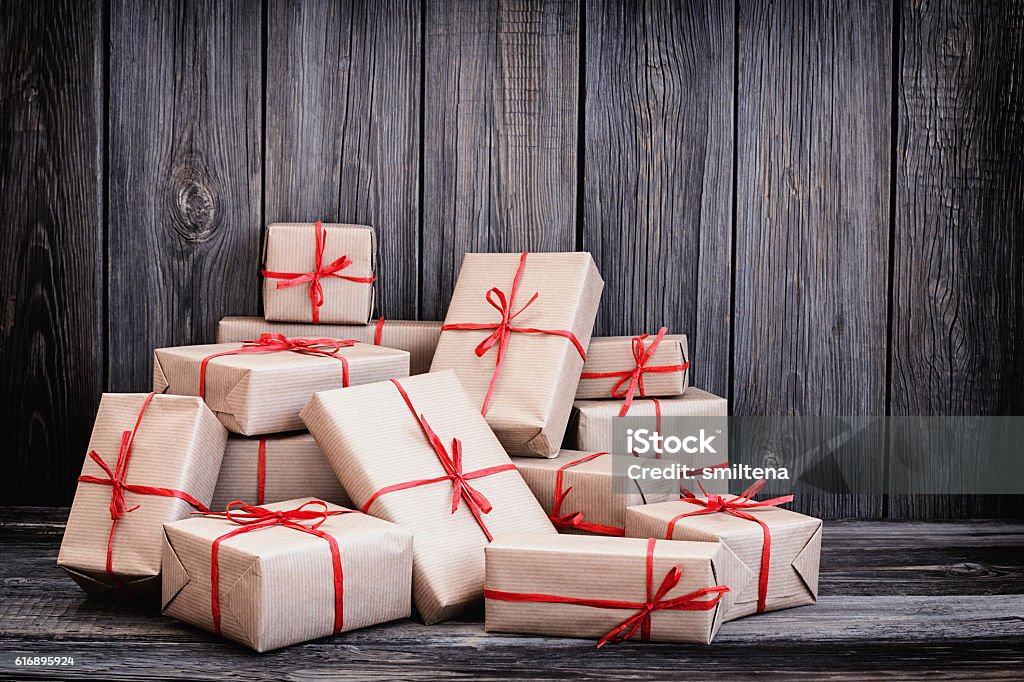 Vintage packages against the background of the old wooden boards Gift Stock Photo