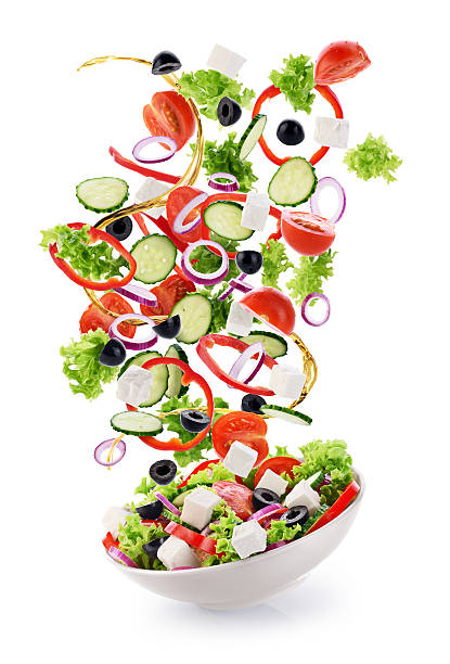 istock Flying salad ingredients isolated on white background. 616896746