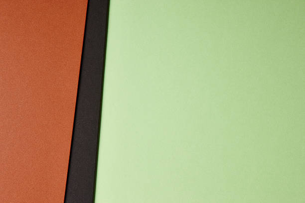 istock Colored carboards background in brown black green tone. Copy spa 616898024