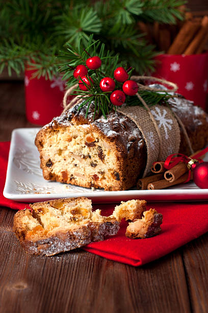 istock Holidays cake with raisins and nuts.  Christmas time composition 616898462