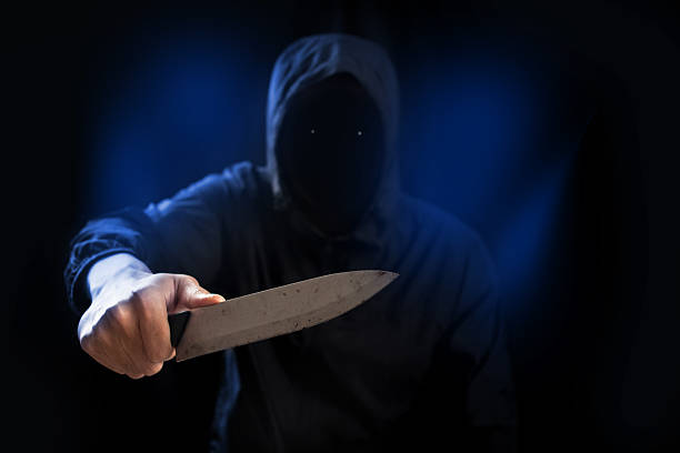istock Dangerous criminal hold knife in hand. 616898930